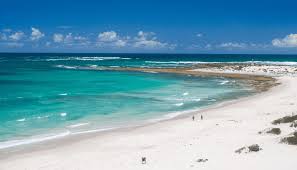 Pristine beach and turquoise waters at Gordon’s Bay and False Bay coast